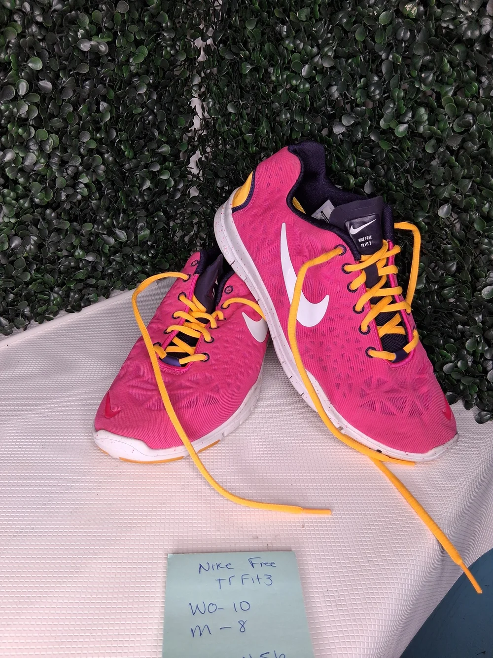 Nike Women’s Pink Training Sneakers with Yellow Laces